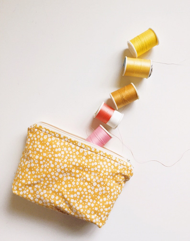 White and Yellow Flower Travel Pouch