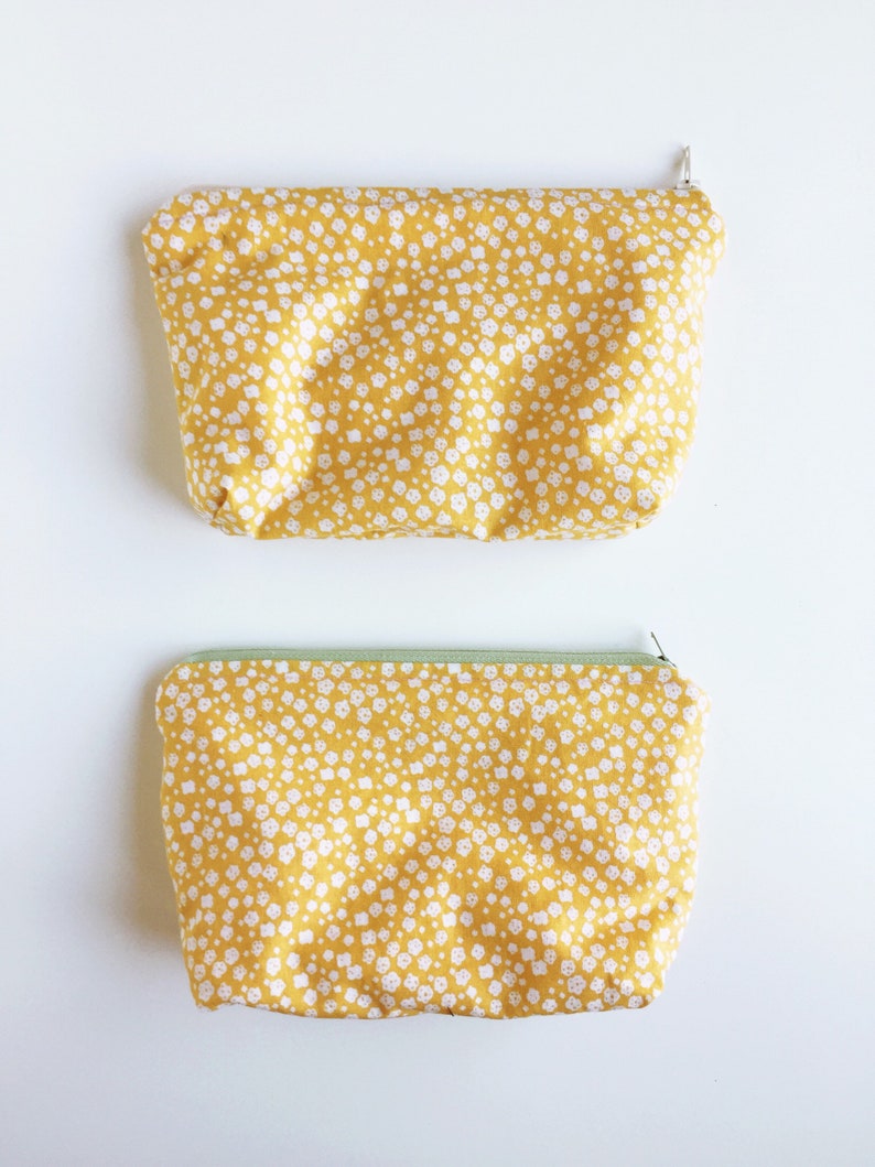 White and Yellow Flower Travel Pouch