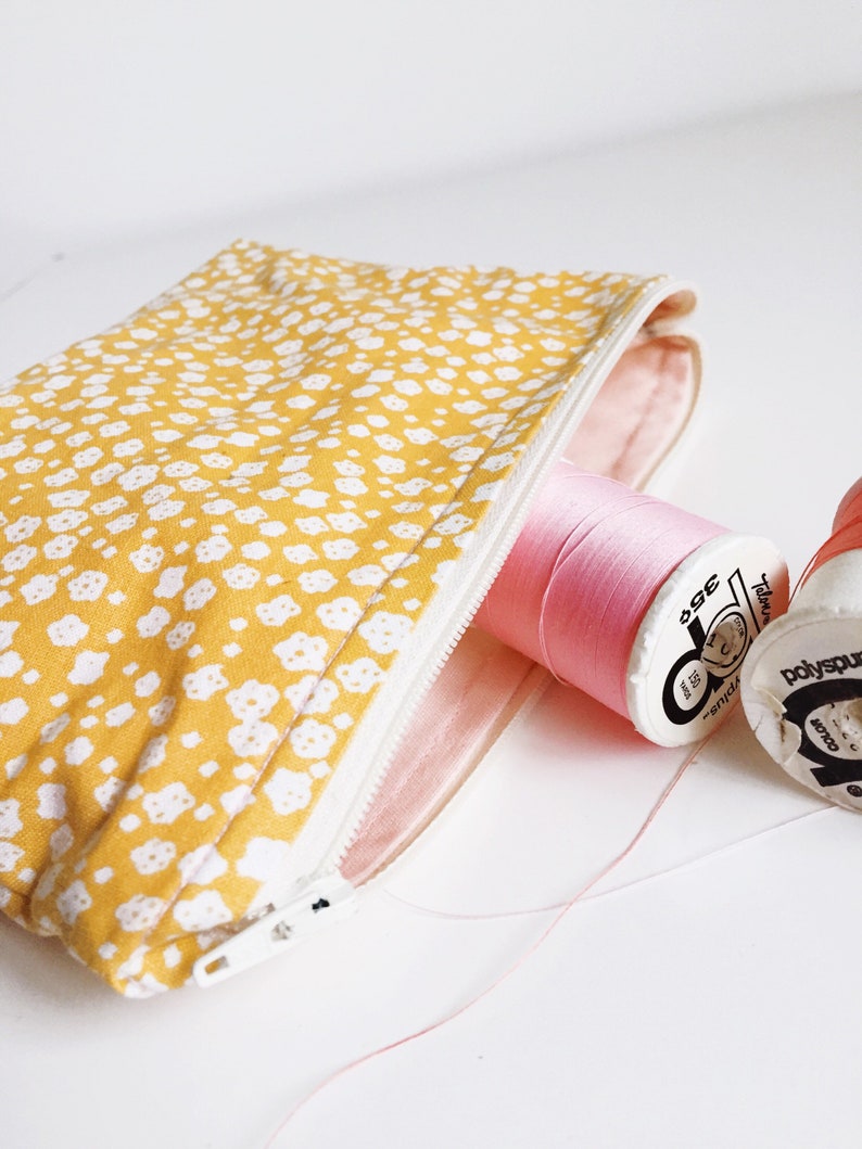 White and Yellow Flower Travel Pouch