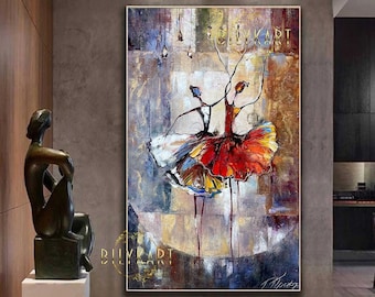 May include: An abstract painting of two ballerinas in colorful tutus. The artwork features a vibrant palette of red, yellow, and blue, with the text "BILYKART" in the upper right corner. The painting is framed and displayed on a wall.