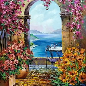 May include: A painting of a stone archway with a view of a blue ocean and mountains in the distance. There is a table and chairs set for two with a bottle of wine and glasses. The archway is covered in pink flowers and there are yellow flowers in the foreground.