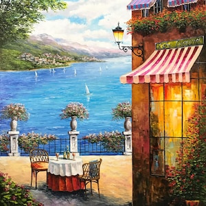 May include: Oil painting of a cafe scene overlooking a blue lake with sailboats. A table with two chairs is set for dining. The cafe has striped awnings and a sign that reads "Cafe Lauren". Flowers and greenery add color.