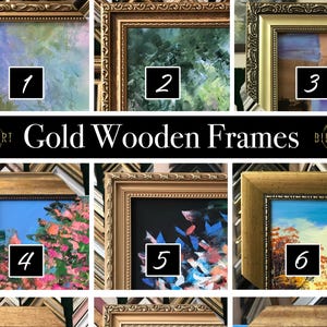 May include: A collection of gold wooden frames, each showcasing a different artwork. The frames vary in style, with ornate and simple designs. The artwork includes landscapes and abstract pieces, with a variety of colors and textures.