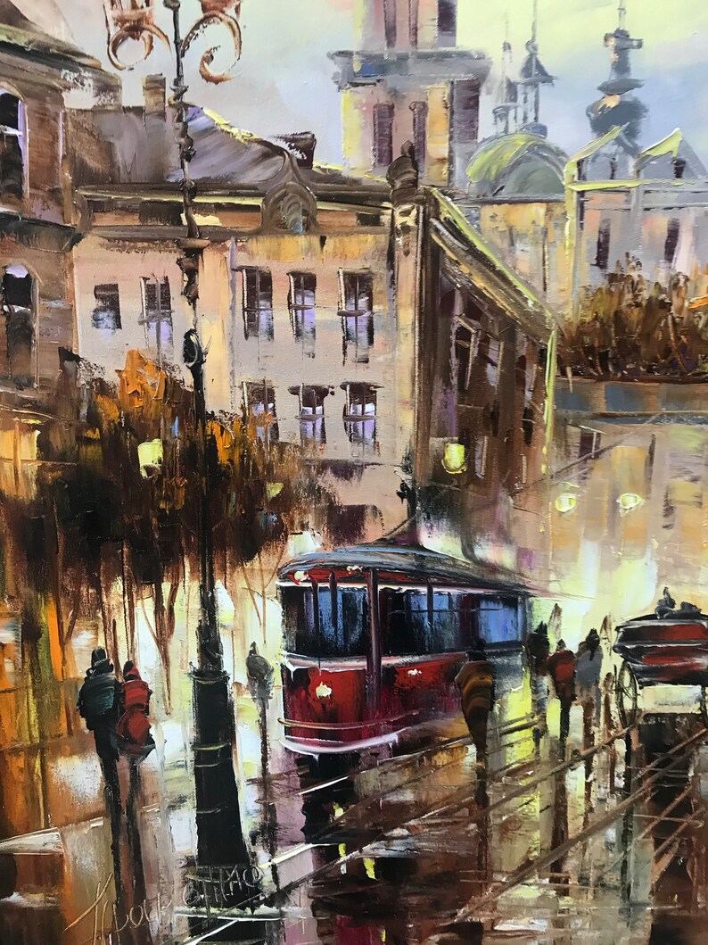May include: An oil painting of a European city street at dusk. A red tram is on the tracks, with people walking on the wet pavement. Buildings with lit windows line the street, and a lamppost is in the foreground.