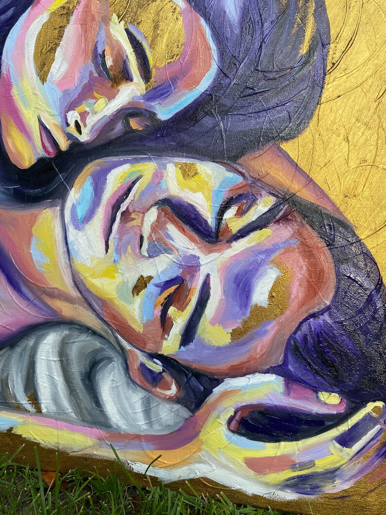 May include: An abstract painting featuring two faces in a close embrace. The artwork uses a palette of purples, yellows, and pinks, with gold leaf accents. The style is expressive, with visible brushstrokes and a textured canvas.