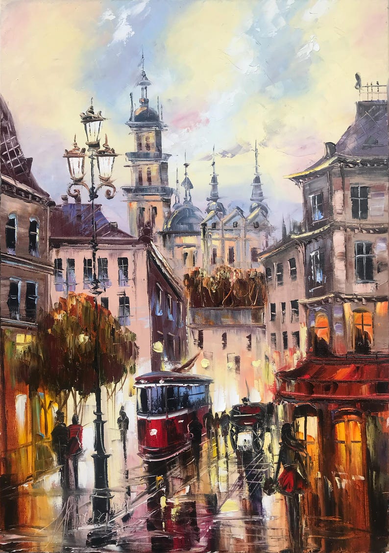 May include: Oil painting depicting a European city street at dusk. A red tram is in the centre, with buildings on either side. The street is wet, reflecting the lights and buildings. The sky is a mix of yellow, pink, and blue.