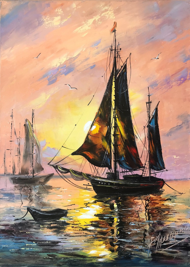 May include: A painting of two sailboats on a body of water at sunset. The larger sailboat has black sails with a red and blue accent. The smaller sailboat is in the background and has black sails. The sky is a mix of orange, pink, and purple. The water is a mix of blue, green, and yellow.