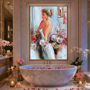 May include: An oil painting of a woman in a white dress with her back to the viewer, surrounded by colorful flowers. The artwork is in a gold frame and hangs above a marble bathtub filled with rose petals.