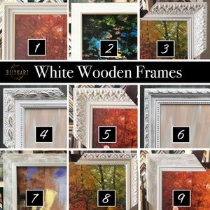 May include: Nine white wooden picture frames with different styles and designs. The frames are arranged in a grid pattern and each frame has a number from 1 to 9. The frames are all empty and ready to be filled with pictures.