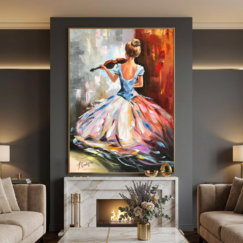 May include: An oil painting shows a woman playing a violin, seen from behind. She wears a blue dress with a full skirt in pink, orange, and white. The background has abstract brushstrokes in grey, red, and white, framed in gold.