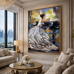 May include: An oil painting depicts a woman in a white gown leaning on a black piano. The artwork has a gold frame and is displayed in a living room with a view of a cityscape and a round coffee table.