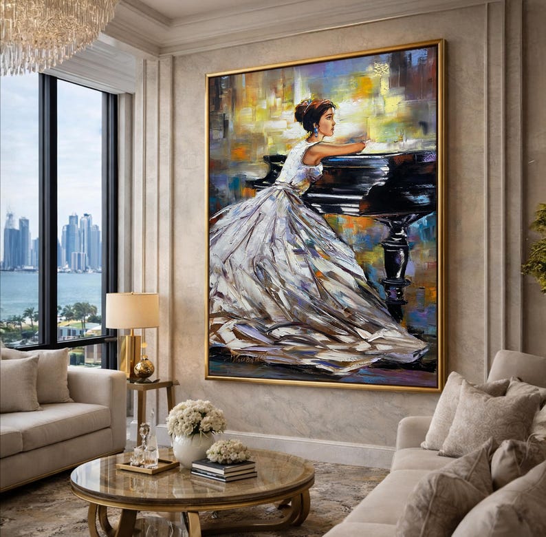 May include: An oil painting depicts a woman in a white gown leaning on a black piano. The artwork has a gold frame and is displayed in a living room with a view of a cityscape and a round coffee table.