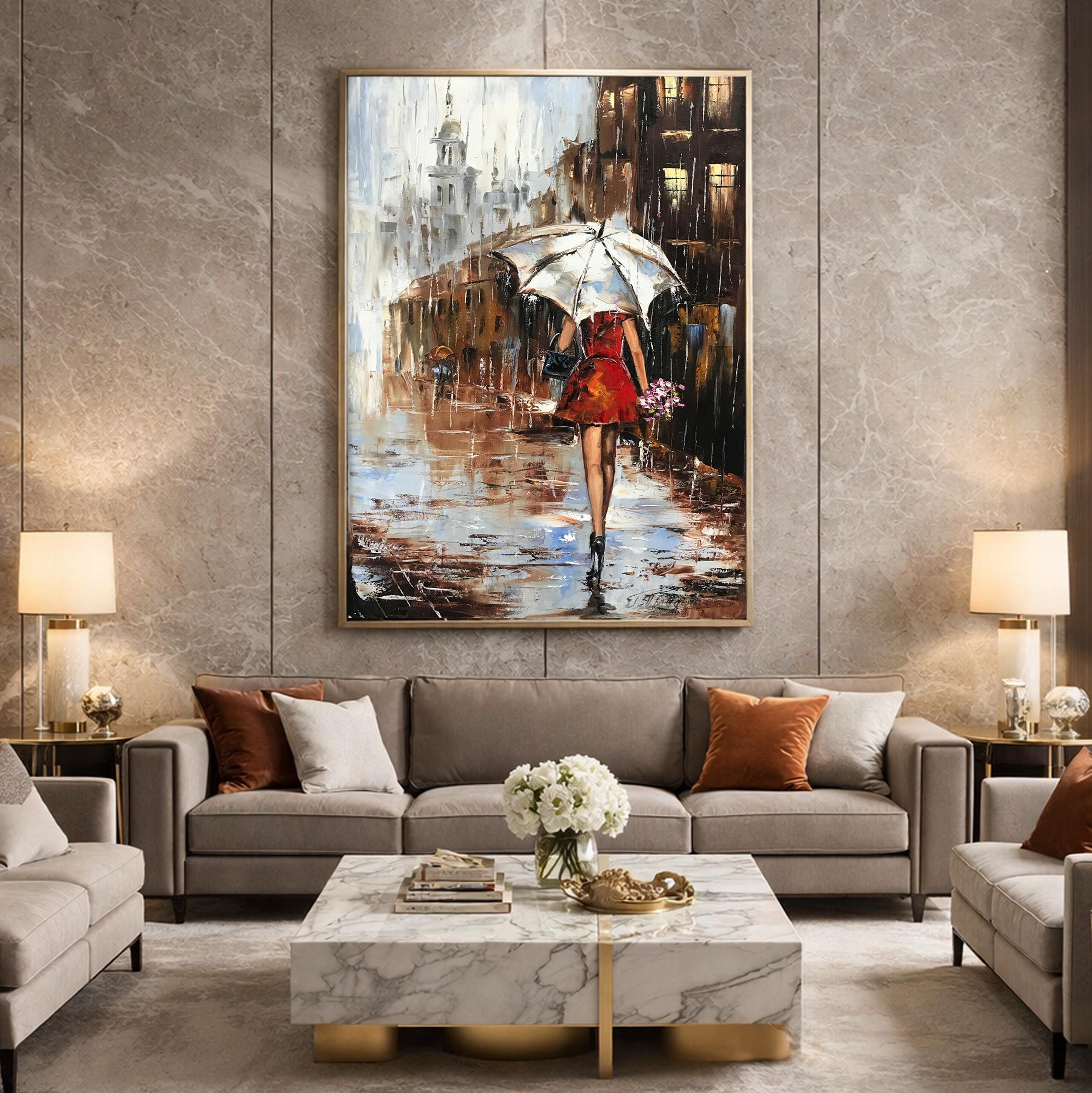 雨の降る街の風景を描いた油絵のオリジナル作品、バンクシーの傘を持っ