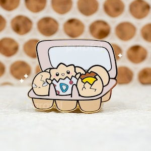 Pin de esmalte de cartón de huevos de Togepi / Pin de Pokémon Togepi kawaii / Pin de esmalte Exeggcute / Pin Togetic Pin Togekiss / Pines de Pokémon con forma de huevo kawaii