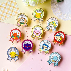 May include: Ten enamel pins featuring Pokemon characters with humorous phrases like "One Brain Cell", "Full of Rage", "Dead Inside", "Always Tired", "Did the Thing", "Healing", "Still Alive", "Overwhelmed", "Corporate Slave", and "F*ck".
