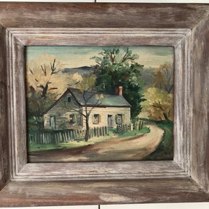 May include: A painting of a white farmhouse with a green roof and a wooden fence. The house is situated on a dirt road that winds through a wooded area. The trees are a mix of green and brown, and the sky is a light blue.