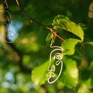 Gold Wire Face Earrings