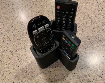 Remote holder/caddy/organizer for 3 remotes, one chubby compartment for DirecTV remotes.