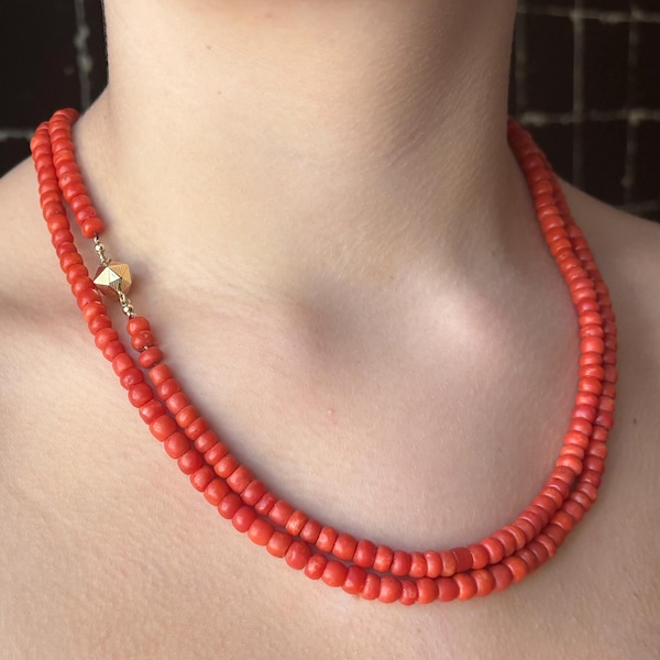 Long, 111cm-long, double-weave blood coral necklace with 14-karat gold 10mm clasp. Authentic, warm-colored blood coral (240 pieces in total)