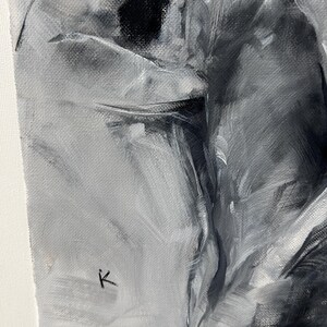 May include: A grayscale abstract painting on canvas. The artwork features a blend of black, white, and gray brushstrokes, creating a textured and dynamic composition. The artist's signature, a small "K", is visible in the lower left corner.