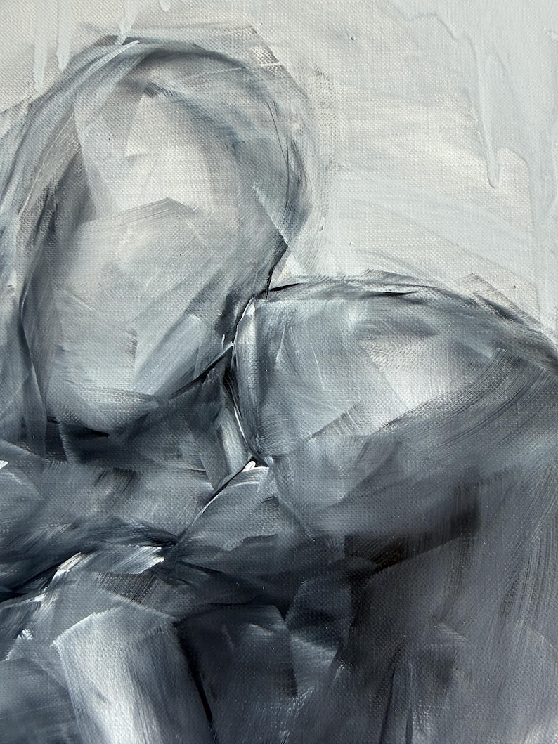 May include: An abstract oil painting on canvas featuring two figures in an embrace, rendered in monochromatic shades of charcoal, slate gray, and white. The composition utilizes broad, visible brushstrokes to create depth and texture.