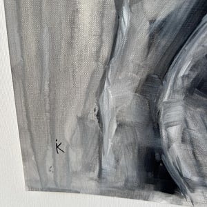 May include: A grayscale oil painting on canvas. The artwork features broad brushstrokes in shades of gray, creating a textured surface. The artist's signature, a lowercase "k", is visible in the lower left corner. The painting's subject is abstract.