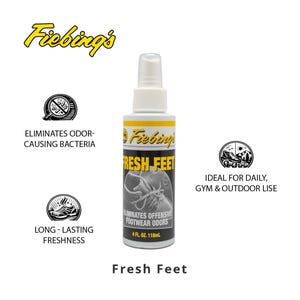 Può includere: Una bottiglia bianca e gialla di spray Fresh Feet per eliminare gli odori delle scarpe. La bottiglia ha un erogatore spray e presenta il marchio "Fiebing's" in giallo. L'etichetta indica che elimina gli odori sgradevoli delle calzature e contiene 118 ml.