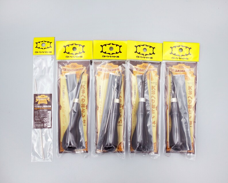 May include: Five individually packaged leather crafting tools. Each tool is labeled "KS Leathercraft" and has a Japanese language description. The tools are labeled with numbers 1 through 5.