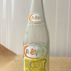 A Vintage Soda Pop Bottle - A & W Root Beer - 10 Oz