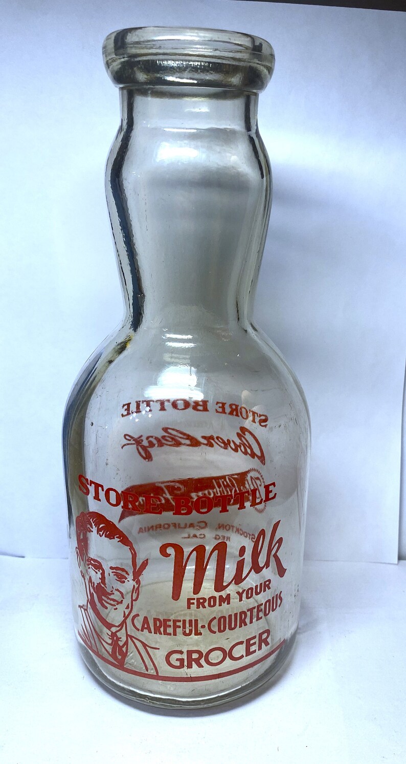 A Vintage Quart Cream Top Milk Bottle cloverleaf Dairy, Stockton, CA