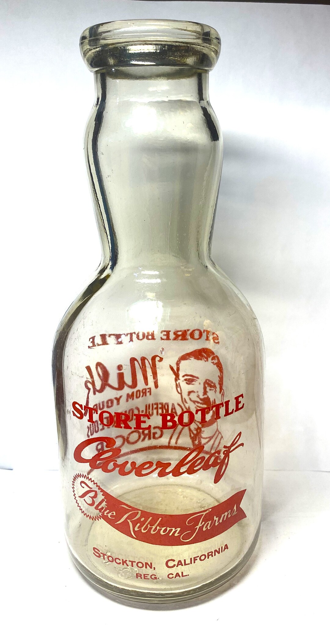 A Vintage Quart Cream Top Milk Bottle cloverleaf Dairy, Stockton, CA