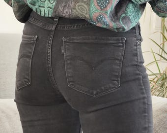 Vaqueros Levi's negros ajustados de tiro alto 721 vintage / Pantalones vaqueros negros de los años 2000 W26 L30