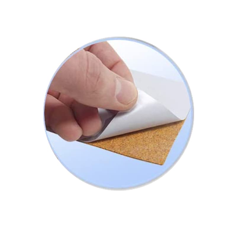 May include: A close-up of a brown adhesive patch with a white backing being peeled off. The patch is rectangular and has a rough texture.