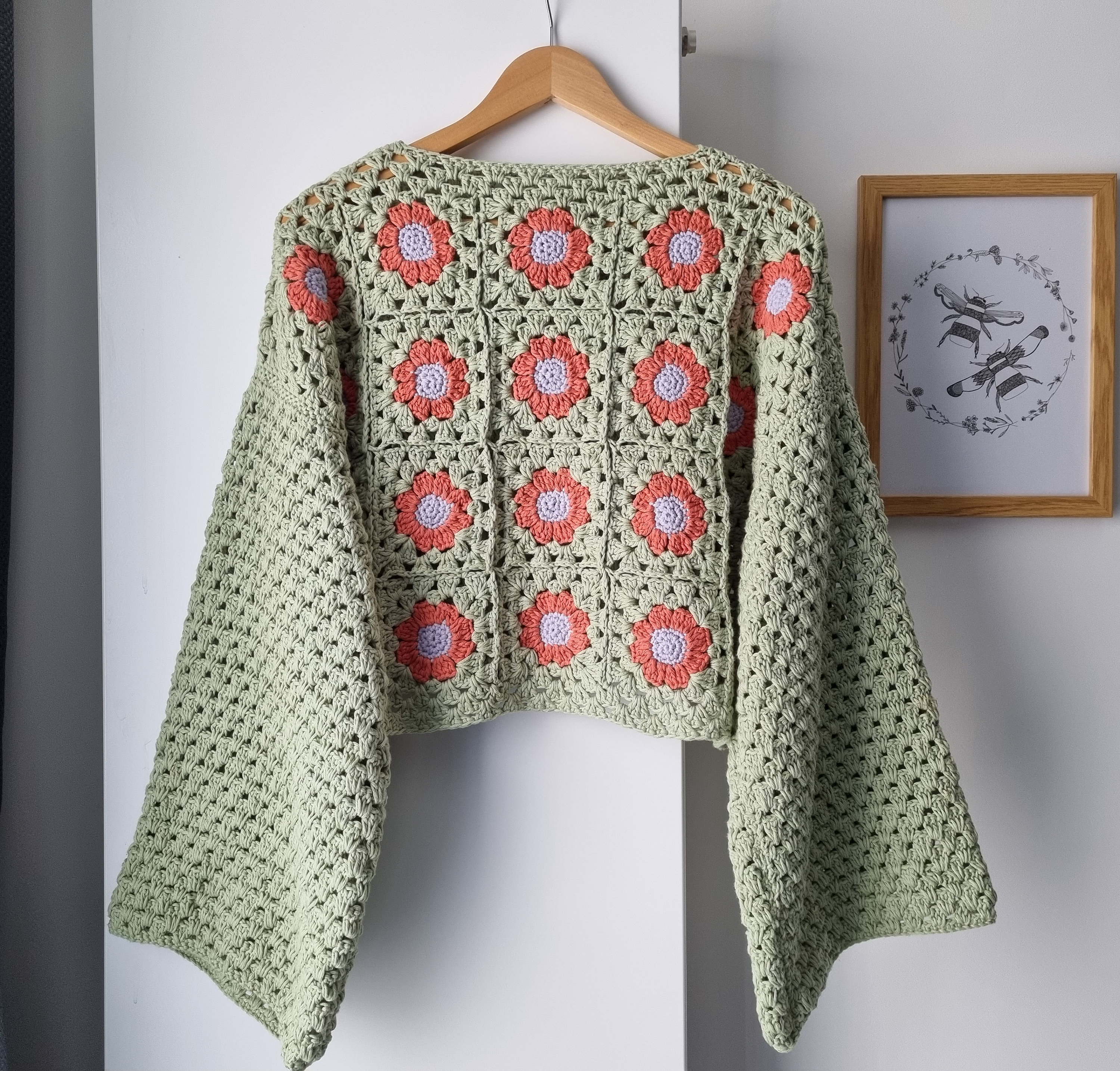 34 Crochet Jumpers with Cowl Necks, Raglans, and Crop Tops 14 Crochet Flower Jumper Pattern: Granny Square Design (