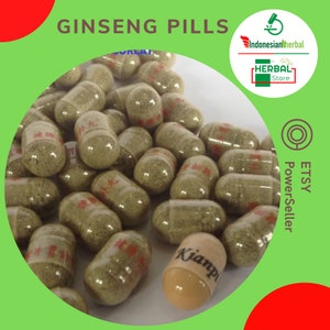 May include: A close-up image of a pile of ginseng pills in clear capsules. The pills are a light brown colour and have Chinese characters printed on them. The text "Kianpi" is visible on one of the pills. The image also includes the text "Ginseng Pills" and "Indonesian Herbal Store".