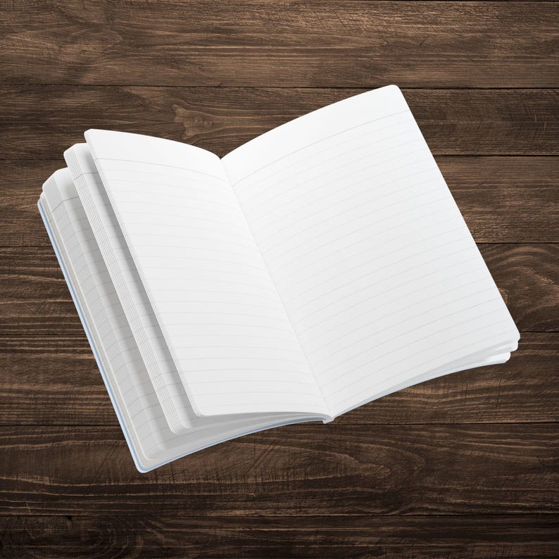 May include: An open notebook with lined pages, lying on a brown wooden surface.