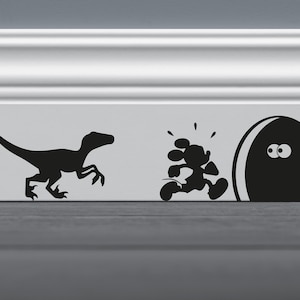 Jurassic Park Themed/Mickey Mouse Hole Skirting Board Vinyl Wall Decal Sticker (Chased by Velociraptor)