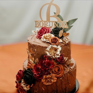 Burgundy, Gold, Orange, and Black Floral Tropical Wedding Cake Decor