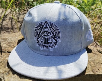Cap Man and God grey