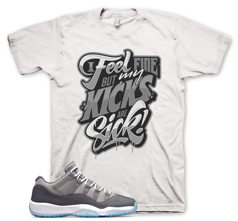 white and grey jordan shirt