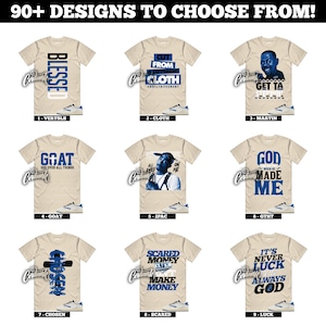 May include: A collection of beige t-shirts with various designs in blue and black. The designs include text like "BLESSED", "CUT FROM A DIFFERENT CLOTH", and "GET TA STEPPIN!". Each shirt is paired with a pair of white and blue sneakers.