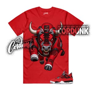 May include: Red t-shirt featuring a stylized bull graphic with a matching pair of red and black sneakers. The bull design incorporates elements of sneaker design. The text "CORDUNK" is visible on the shirt.