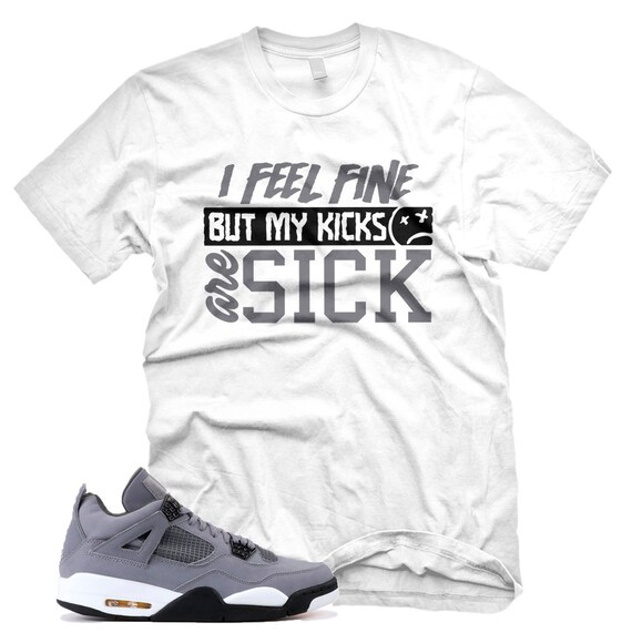 white and grey jordan shirt
