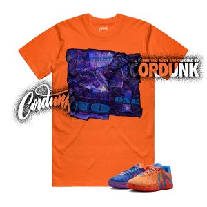 May include: A bright orange short-sleeve t-shirt featuring a central rectangular graphic with a purple and blue patterned design, the text "TRUST NO ONE," and the brand name "CORDUNK." Two athletic sneakers in matching orange and blue colors.