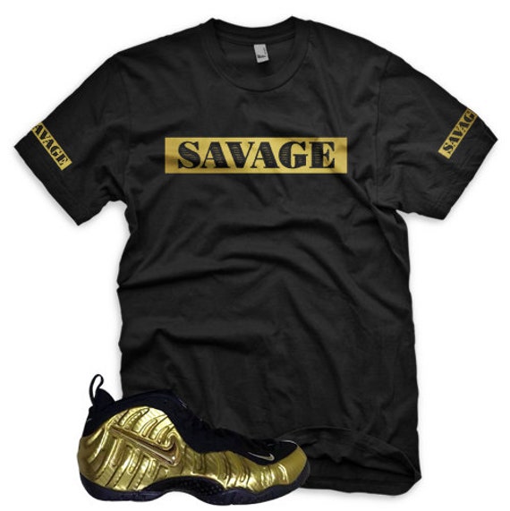 metallic gold nike shirt