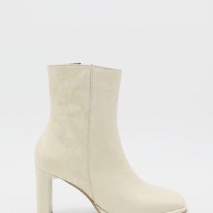 Indigo heeled ankle boots in off white leather womens shoes