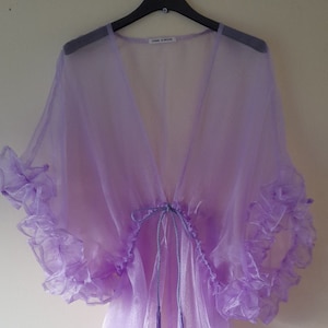 A lilac organza kaftan with ruffle details, size 8 - 14