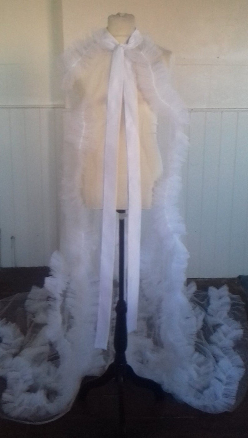 A full white super long tulle cape, one size for all gender#39;