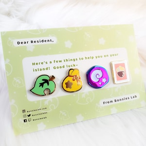 May include: A card with a green leaf, a yellow bag with a star, a purple and blue shell with stars, and a red card with an acorn. The card says "Dear Resident, Here's a few things to help you on your island! Good luck- From Bonnies Lab".