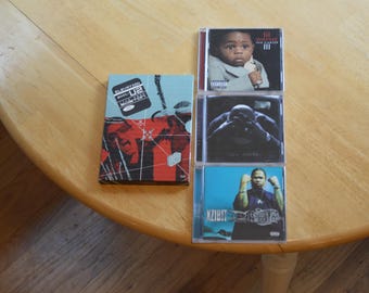 6 Music Items---3 Music CD's & 1 Music DVD---2 Empty Music Cases---LL Cool J, U2, Xzibit, Wayne Tha Carter--1990's Music--Early 2000's Music